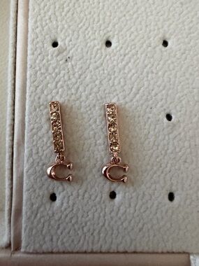 Coach Rose Gold Crystal Bar Drop Earrings with C Charm